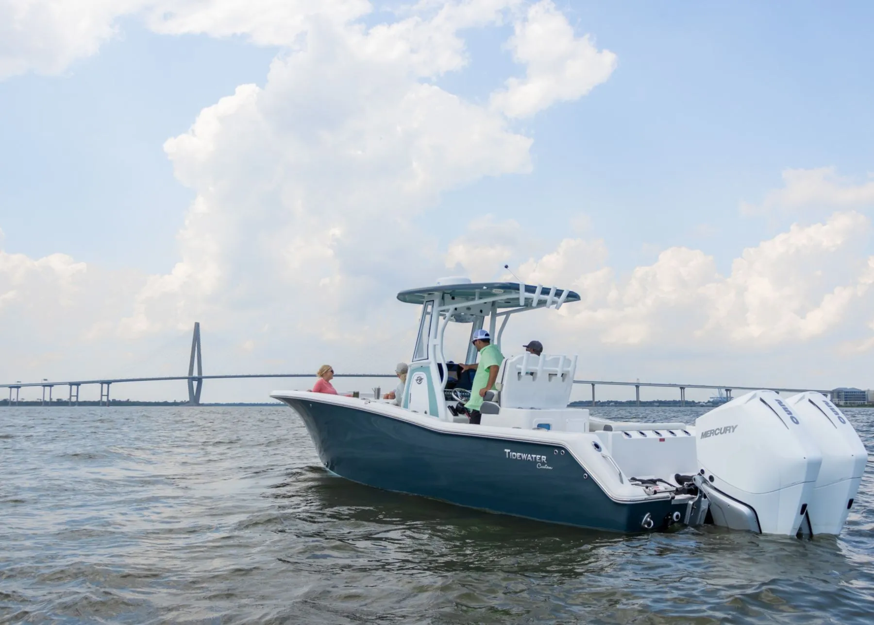 Center console boat running past the Ravenel Bridge, Charleston SC